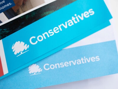 London, Uk April 2021: Conservative Political Party Logo On Campaign Literature